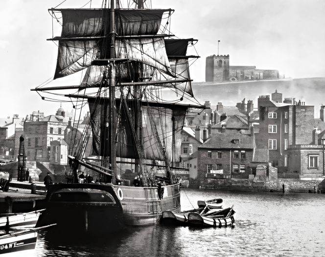 Whitby Upper Harbour, photographed by Frank Meadow Sutcliffe in the 1890s. St Mary’s Church is visible on top of the town’s east cliff, a parish church where many weddings took place in the 19th century and earlier in time. (Courtesy: Whitby Museum…, Photographic Collection, 3-55A).