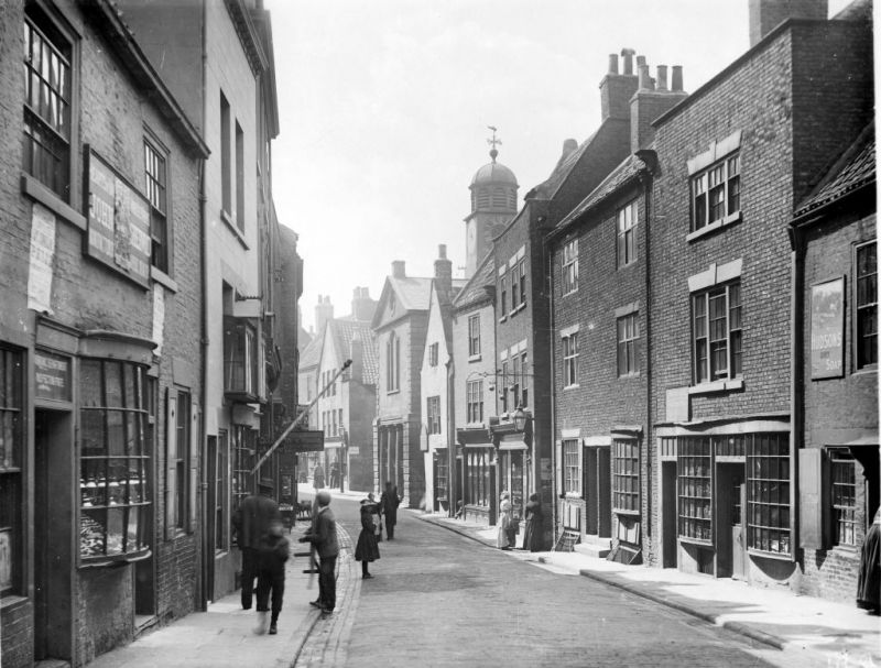 Church Street in Whitby. Successive censuses reveal that most rag gatherers lived along this street. Photo by Frank Meadow Sutcliffe, 1890s. (Courtesy of: Whitby Museum, Library & Archive, Photo Album 4/9).