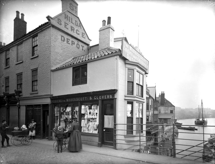 The Misses Scott’s establishment was immortalised in this photograph by Frank Meadow Sutcliffe at Bridge End circa 1895: ‘Hosiers The Misses Scott & Glovers’ & ‘ The Misses Scott Ladies and Children’s Outfitter’. (Courtesy of: Frank M. Sutcliffe, Whitby Museum, Photographic Collection).