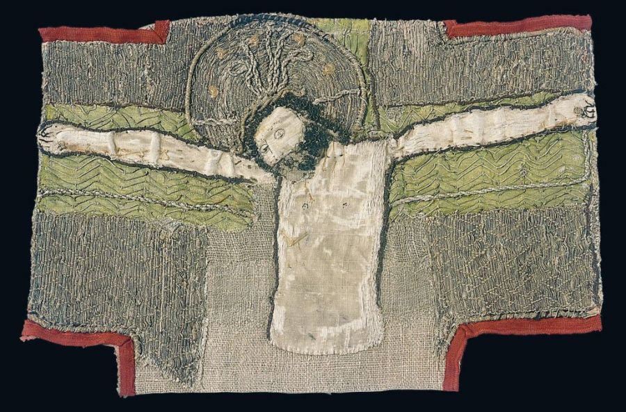 This fragmented piece of “The Crucifixion” – once the centre point of the cross on a chasuble, demonstrates various embroidery techniques. Jesus was made in an appliqué style of white silk fabric neatly nested to a foundation of linen. Various stitching gives life to his face and hair, while the background in an intricate laid work of gold and silk probably indicates that this embroidery originated from a professional workshop in Flanders. Red and green silk fabrics are also significant decorative parts of the composition; height 26,5 cm and width 38,5 cm. Photo: The IK Foundation, London.