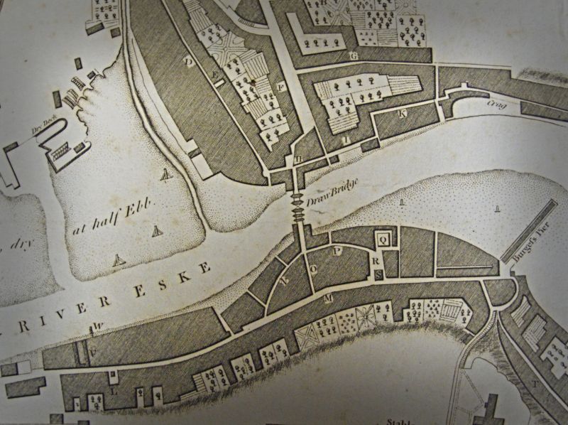 Whitby during the 1770s, with the streets of origins in the Middle Ages, gathered on each side of the ‘Draw Bridge’ and at this time many of the properties still had large gardens. |‘Plan of the Town and Harbour of Whitby. Made in the Year 1778…’ Part of Lionel Charlton’s book in the following year. (Collection: Whitby Museum, Library & Archive, Plans and Views of Whitby 769.942.74, part of the map). Photo: Viveka Hansen, The IK Foundation. 