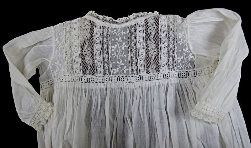 Christening gown with machine-made lace and late-Victorian whitework embroidery. (Collection: Whitby Museum…, Costume Collection, GBI43). Photo: Viveka Hansen, The IK Foundation. 