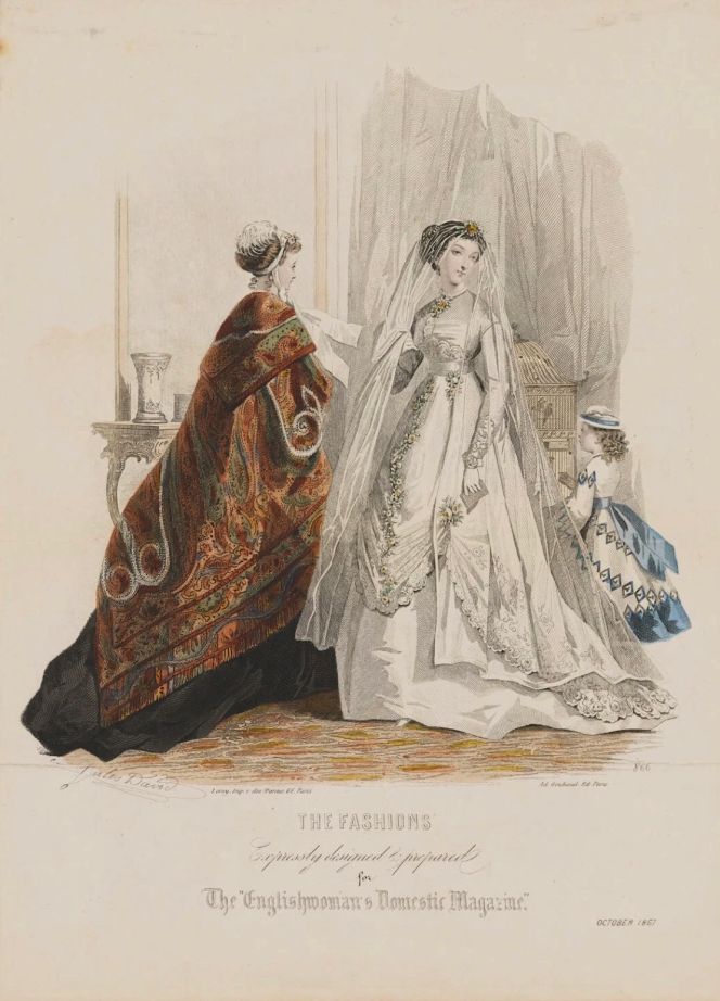 Well-off women increasingly began to wear white for their weddings, particularly during the 1860s, and many continued to use the same dress in other social situations in the first year after their wedding, often with added decorative elements such as extra lace or netting or lengthened sleeves. Although the Whitby Costume Collection contains no white wedding dresses of such an early date, many of its expensive coloured dresses may originally have been intended for a young bride and were continued to be worn afterwards as the best dress for several years. However, this plate – ‘The Fashions’ in October 1867 – is a good example of a fashionable white silk wedding toilet, originally published in ‘The Englishwoman’s Domestic Magazine’, a monthly magazine in the period 1852-79 aiming to reach the Victorian middle-class woman – probably also sold in the coastal town of Whitby. This type of dress, decorated with artificial flowers, embroidery, lace, a matching veil and other exquisite accessories, was obviously intended for a well-to-do clientele. (Courtesy: National Portrait Gallery, Reference Collection NPG D48029. Creative Commons).