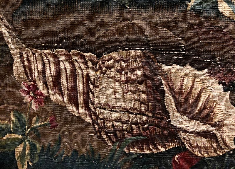 Seaport | ‘Les Ports de Mer’. Wool and silk on the wool warp. Beauvais workshop and signed BEHAGLE, that is to say under the directorship of Philippe Béhagle in the period 1684 to 1705.| Workshop of Josse Kerchove and Adrian Campion, cartoon by Simon III du Pape. 308 x 153 cm. Detail of a conch shell. (Collection: Design Museum Danmark, København. Exhibition 2019. No: B 44/1911, part of). Photo: Viveka Hansen, The IK Foundation.