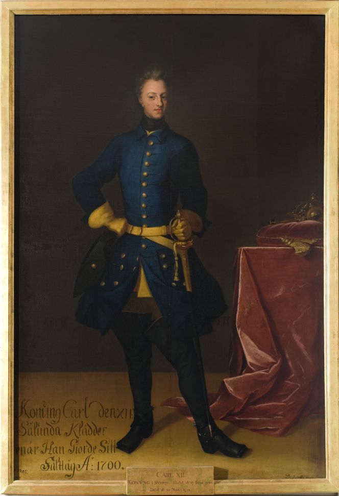 Karl XII was one of the Swedish kings along with other military men of the late 17th- and early 18th centuries who wore dark blue justaucoups, which this larger than life-size oil on canvas demonstrates – attributed to the artist David von Krafft (1655-1724). The text reads in translation: ‘King Carl the XII. In this way he was dressed when doing his campaign in the year 1700’. (Courtesy: Nationalmuseum, Stockholm. No. NMGrh 1267. Public Domain).
