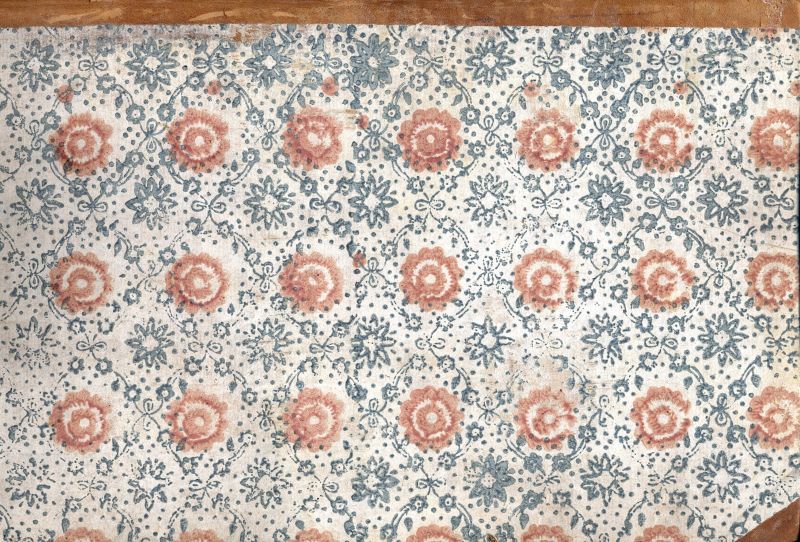 This account book dating 1775, from one of the other homes of the Piper family, is a representative example of how pieces of 18th century wallpapers have been preserved. A typical mid-century design with its flowery motifs in blue and pink on a white ground, it may be assumed that some rooms at Christinehof manor house were decorated with similar wallpapers at the time of the Inventory in 1758. (Collection: Historical Archive of Högestad and Christinehof, Piper Family Archive, no. G/VI 5). Photo: The IK Foundation, London.