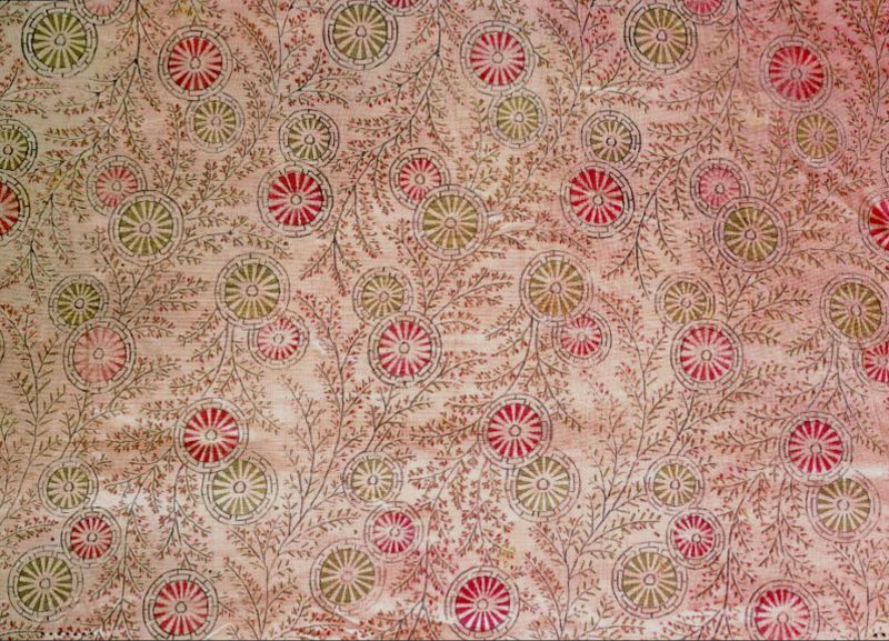 Thunberg also observed how red colours were obtained using plants for textile dyeing. His travel journal gave an account of how people in the provinces dyed red using Rubia cordata, related to common madder, Rubia tinctorum, which the Swedish dyers, like many dyers from other countries, used for the production of red yarns and fabrics. This nightgown – which among other colours, was probably block printed red with Rubia cordata – a garment Thunberg brought back from Japan, also mentioned in his travel journal. The wadded garment – has a wheel motif with floral garlands – on plain woven silk. (Courtesy: Thunberg Collection, Museum of Ethnography, Sweden. No. 1874.1.87).