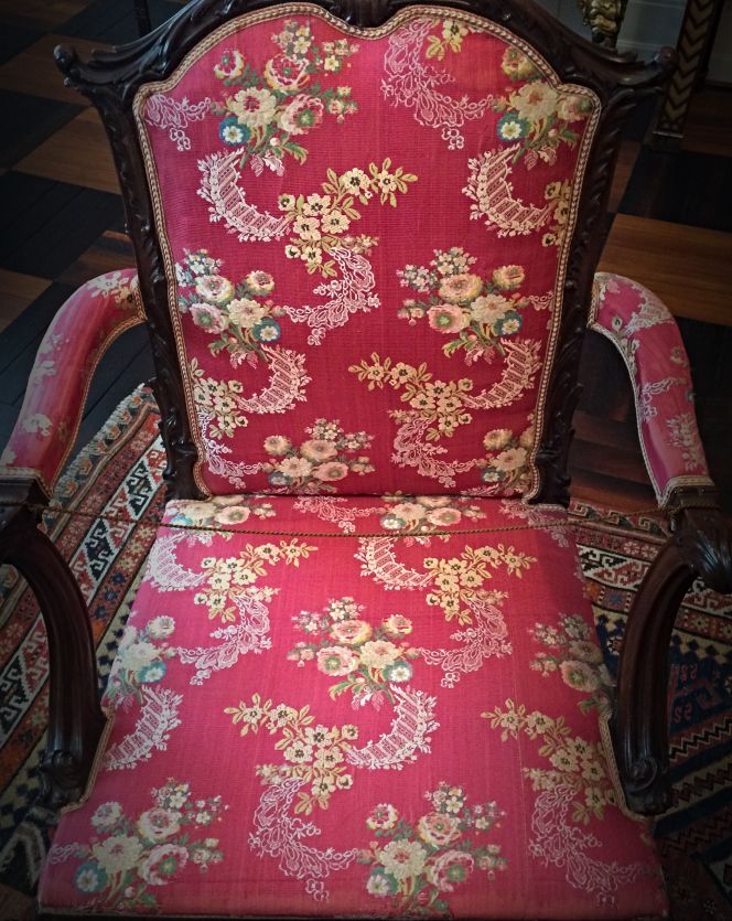 French figured silks were popular and much admired by wealthy customers who could afford such luxury and sumptuousness in the household. It may be assumed that this armchair originally was part of a set of furniture with the same chosen quality for upholstery, whilst the vibrant crimson colour most probably had been yarn dyed with the most admired dye of the time – cochineal. This is one of the most durable natural dyes for red colours, which may explain why the armchair still up to this day only is slightly faded, even if it has been part of the permanent exhibition of this 18th century interior for more than a decade and prior to this most probably exposed to light over many more years. (Collection: David Collection in København, Denmark. No: 26/1975). Photo: Viveka Hansen, The IK Foundation.