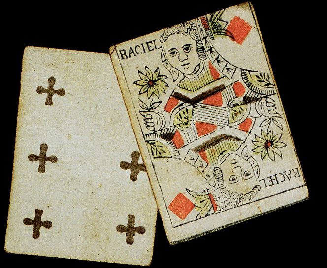 Interestingly, the Piper Family archive includes two playing cards of a similar type as on the painting above, probably dating from the 1750s to 1770s, of which one is the Queen of Diamonds and the other six of clubs. The latter is entirely hand-painted, whilst the contour of the Queen is printed and finished off with yellow and red colours by hand. (Collection: Historical Archive… D/IX: Playing cards). Photo: The IK Foundation.