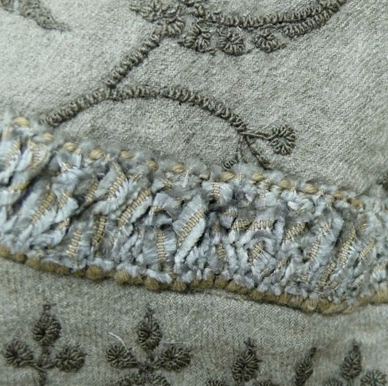 The garment is altogether professionally made including features as; parts of the back  lined with a dark grey silk fabric, while this close-up image showing the decorative silk  braids harmonising with the machine embroidery to a high fashionable standard.  (Whitby Museum, Costume Collection) Photo: The IK Foundation, London.