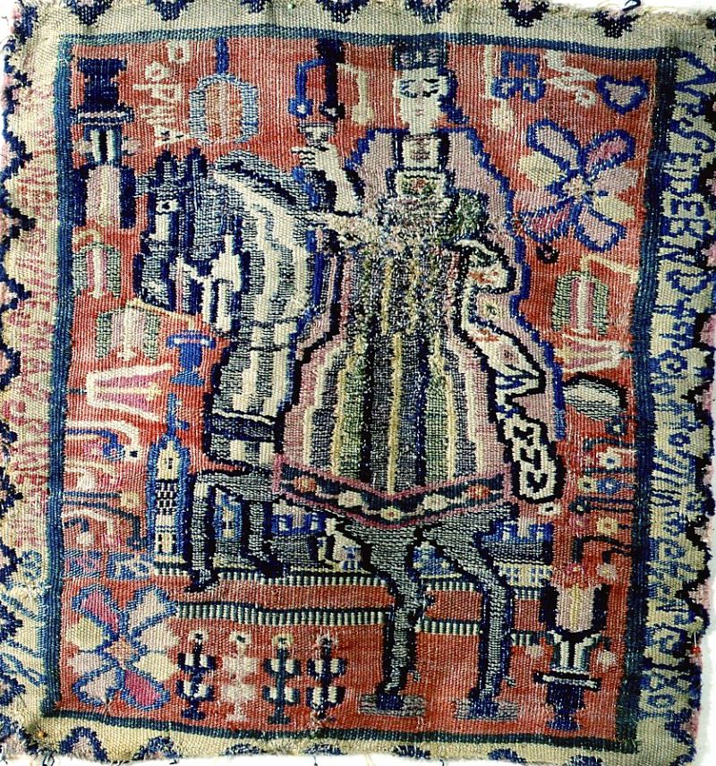 The most complicated marking found from Oxie district was placed on this unique cushion depicting a lady on horseback, including a long line of disconnected capital letters together with ‘KNB 1801’. The next sentence reads ‘Albertina Sofia prinsessa af Sverige’ (Albertina Sofia princess of Sweden) and the letters ‘DNEB’. If this woven seat cushion was intended as a gift for the person in question, or if the lady only was meant to depict Sofia Albertina is unknown. Otherwise the marking on the cushion corresponds well with her years of life (1753-1829) and the year 1801 is also within the period when double interlocked tapestries still were registered quite frequently in the estate inventories.(Owner: Malmö Museums no. 29.423). Photo: The IK Foundation, London.