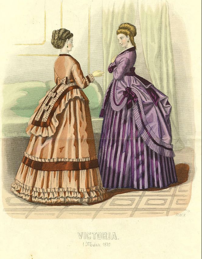 In the period from 1867 to 1870: Skirt now flatter in front but still prominent behind, preferably  made of plain material decorated with every type of fringe and ribbon or other applied ornaments.  The collar usually high, sleeves again narrow and straight. Decoration was now what mattered most,  the garment itself being simpler than before. (Courtesy of: Fashion Magazine, “Victoria”, 1870, Wikipedia).