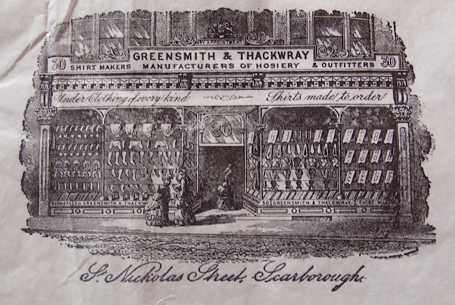 This print gives a rare opportunity to study the kind of wares Greensmith & Thackwray had for sale, as  well as their technique of window dressing to attract their clientele. Judging by the ladies dressed in skirts  supported by bustles viewing the shop windows of their shop in Scarborough, this print originates  from the 1870s or 1880s. (Print on paper bag, private ownership).