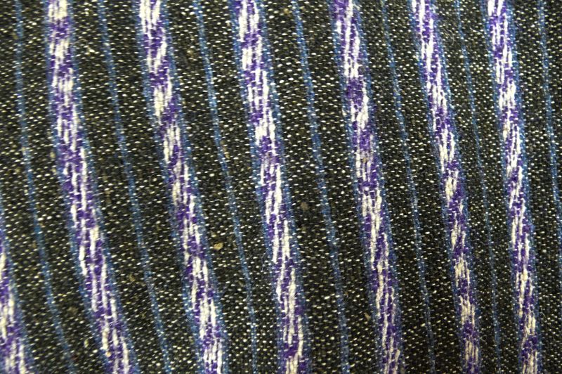 This close-up image of the first bathing costume was machine-sewn from a strong, coarse woollen material with narrow stripes and would have fitted an older child in the late Victorian period. Apart from the fact that this woollen outfit must have been highly prickly to the skin, it must also have been heavy and awkward in the water. (Collection: Whitby Museum, Costume Collection, GBD 110). Photo: Viveka Hansen, The IK Foundation.