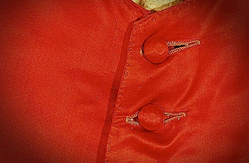 Close-up detail of a red silk waistcoat dated to 1778. (Courtesy: Nordic Museum, Stockholm, Sweden. NM.0044146).