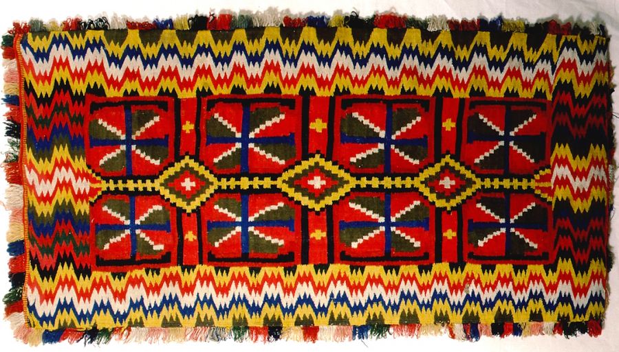 This travel cushion from the south west area of Skåne is exceptionally well preserved in its colours.  The textile is undated, but probably woven during the period 1770-1820. (Owner: Malmö  Museums no. 443). Photo: The IK Foundation, London.
