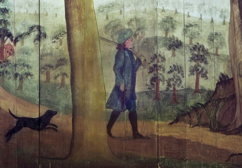 This wallpainting dated to the 1770s at Högbo Works in the province of Gästrikland, further demonstrates that the tradition to wear a blue woollen coat by farmers, hunters et al had a similar use in a large geographical area, stretching over at least 800 kilometres in Sweden. Like on this depiction of ‘Hunter with dog’, blue often seems to have been the preferred colour, but Carl Linnaeus observed the advantage with green shades in his journal from the Skåne Journey in 1749. Before reaching this southerly province, he stopped at various places in southern Småland to make observations. On 10 May in the parish of Bergkvara, where he noted: ‘The shooter is wearing green clothes and a green cap, so the birds will not notice him’. (Courtesy: The Nordic Museum, Stockholm. NMA.0048066, part of. Digitalt Museum).