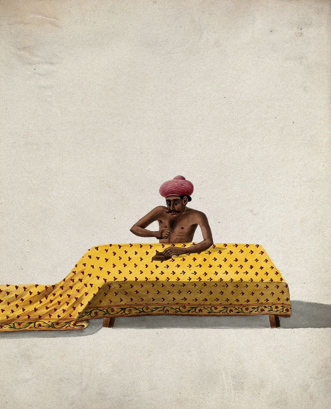 ‘A man engaged in block printing a piece of cloth’ – on a gouache painting by an unknown Indian artist, dating circa 1800-1899. This depiction is comparable to König’s reflections on printing forms; he noted: ‘The printing forms are carved of Teak wood, the biggest of them being little more than one foot long and half a foot wide, but I often saw smaller ones according to the motif.’ (Courtesy: Wellcome Library, 582297i, Various Indian trades and professions 18–, album page 27, painting no 28).