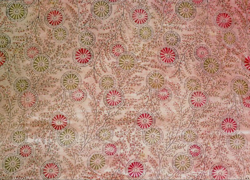 However, to my knowledge, it is unknown if Carl Peter Thunberg used these finely quilted silk garments for his own private use at home over the years. Likewise as it is uncertain when he initially donated the Japanese silk gowns to the Royal Swedish Academy of Sciences or another early museum collection, but it was part of the ‘Uppsala Collection’ for many years. Today the Japanese objects are kept at the Museum of Ethnography in Stockholm, just as several of the other collections amassed by Carl Linnaeus’ travelling apostles around the world. This close-up detail is taken from one of the nightgowns, which was brought back from Japan by Thunberg as well as mentioned in his travel journal. The wadded garment – has a printed wheel motif with floral garlands – on a plain woven silk. (Courtesy: Thunberg Collection, Museum of Ethnography, Sweden. no.1874.1.87).  