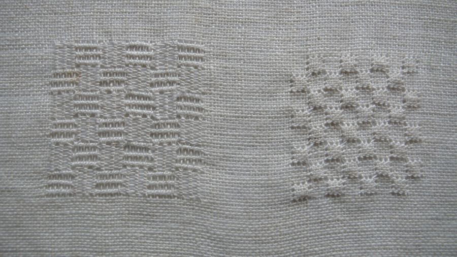 Close up study of two of the whitework stitching reproductions – “basket motif” and shadow stitching. Photo and embroidery: Viveka Hansen.