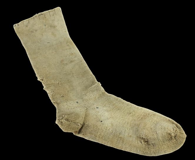 Compared to the German knitted sock quoted above, this illustrated cotton sock had been dated to circa the 1850s-60s in a farming community in central Sweden. It was a garment that had not been mixed with common cotton grass in the knitting process itself, but the leg was instead stuffed with common cotton grass for increased warmth. That is to say, another reason to be knowledgeable about the warming properties of this useful plant, which probably was known to people in Swedish provinces during the 18th century, too. (Courtesy: Länsmuseet Gävleborg, XLM.24681 Gästrikland province, Ovansjö district, Storvik parish. Digitalt Museum).
