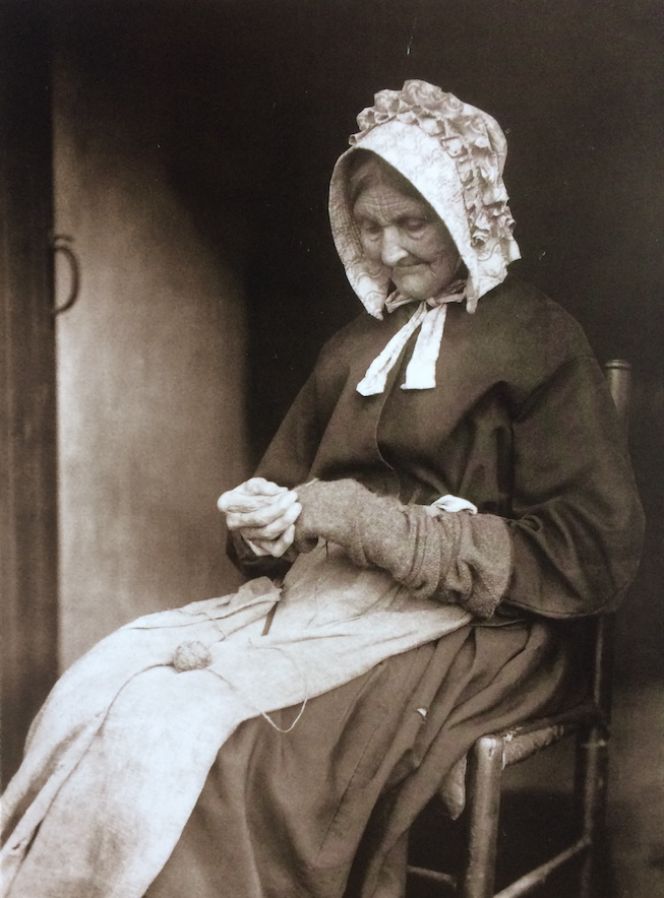 Coarse warm socks or stockings needed darning from time to time. However, no Whitby photograph shows this craft, but in one taken by Frank Meadow Sutcliffe in nearby village of Glaisdale, the elderly Mrs Ann Scarth is sitting in her doorway darning a long stocking. (Courtesy of: Whitby Museum, Photographic Collection, Sutcliffe, 24-8).