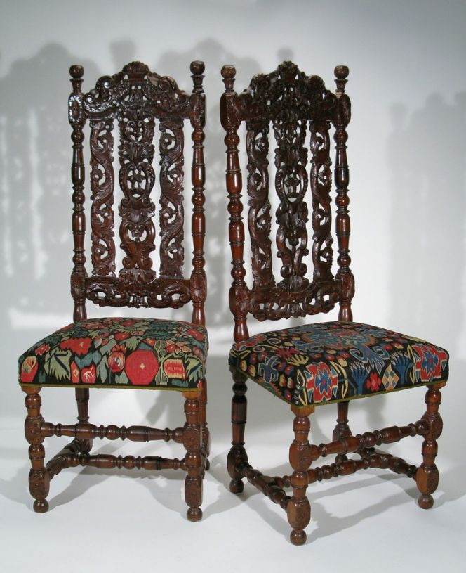 These two baroque style chairs of walnut tree is upholstered with pieces of flamskväv from southwest Skåne,  woven in the late 18th or early 19th century. The colourful fabrics were originally used as either cushions,  bench- or bedcovers primarily woven for the young woman’s dowry and only used for special occasions.  Most of the year the textile treasures were stored in chests, which kept the colours unfaded and preserved for generations. The long-term careful handling of the textiles, became very useful when finding new uses in the  late 19th century, for example to fit the seats of these two chairs. Gift to the Nordic Museum in 1919. (Courtesy of: Nordic Museum, Stockholm, NM.0135172A+B, & historical facts from catalogue card. Creative Commons).