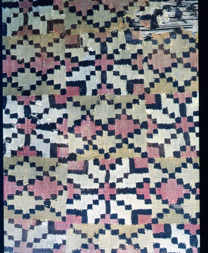 In contrast to the double interlocked tapestry with a simple star motif, where both the warp  thread and woollen weft are of significantly coarser quality. Skåne, Sweden.  (Owner: Malmö Museum). Photo: The IK Foundation, London.
